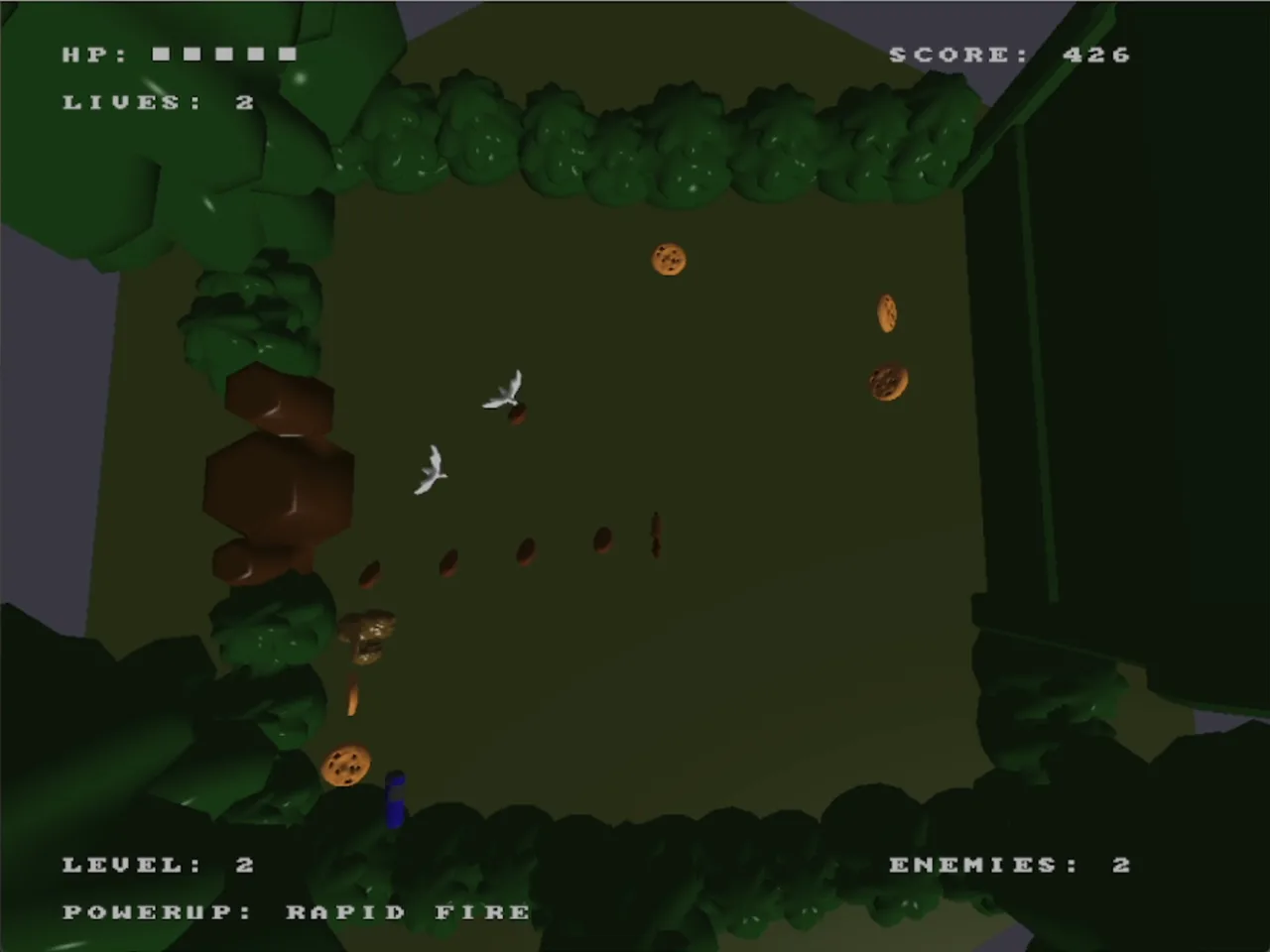 Level 2 with the rapid-fire powerup active: a stream of bullets arcs toward two flying enemies
